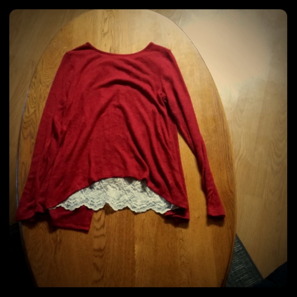 A nice red top with a white lace open back.